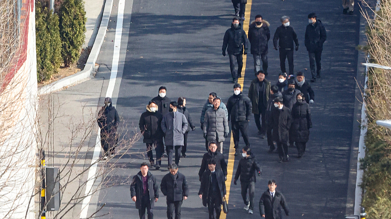 A group of South Korean investigators are seen at the presidential residence in an attempt to arrest the impeached President Yoon Suk-yeol in Seoul, South Korea, January 3, 2025. /CFP