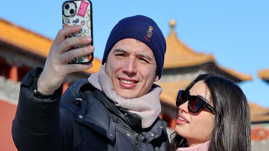 Foreign tourists visiting the Forbidden City in Beijing, Jan 2, 2025./CFP