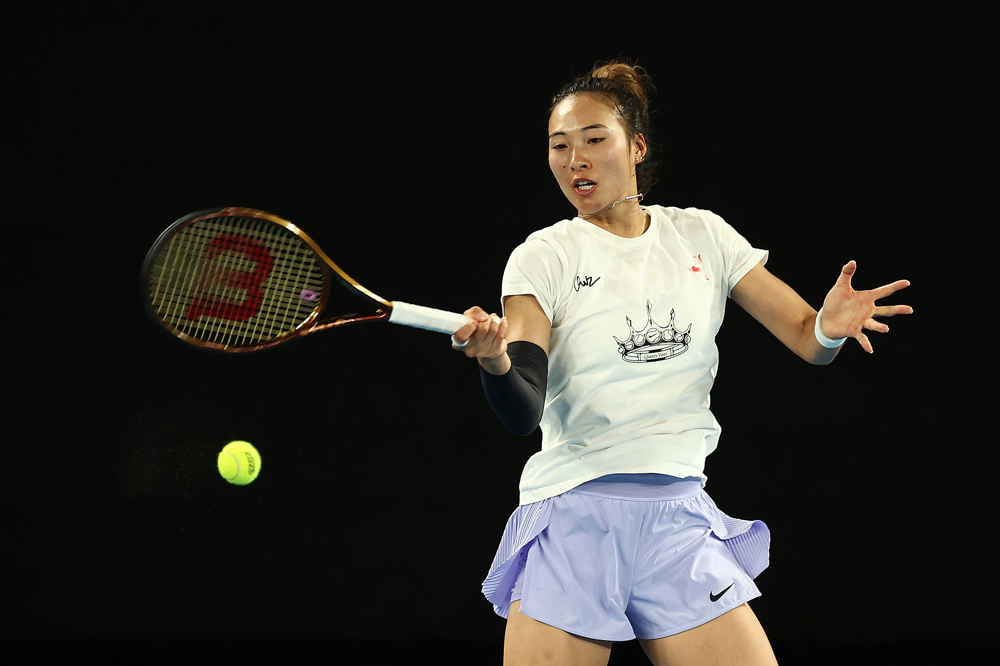 Zheng Qinwen of China hits a shot in practice at Melbourne Park in Melbourne, Australia, January 6, 2025. /CFP 