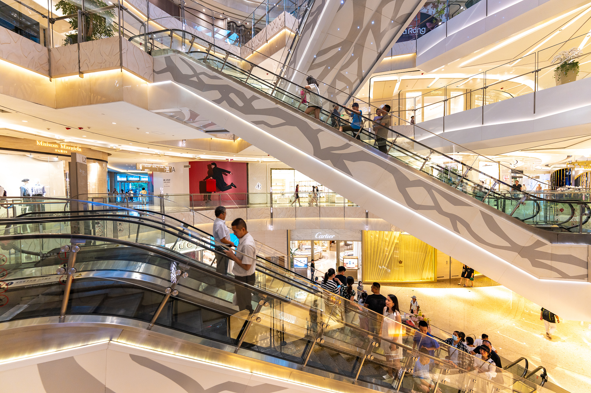 The interior of the Shanghai IFC Mall, featuring luxurious shops and escalators on August 26, 2024, in Shanghai, China. /CFP