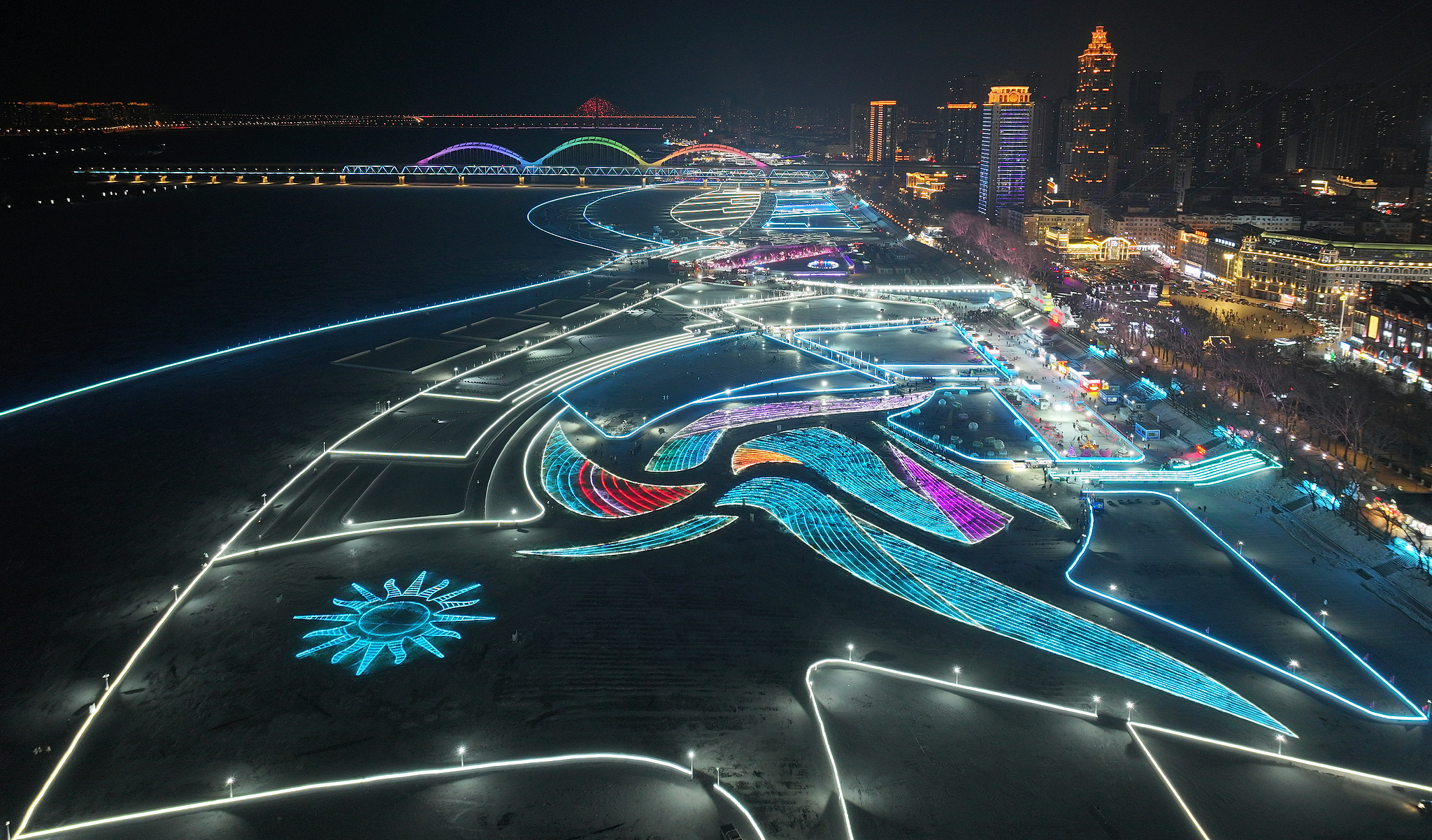 The logo of the 9th Asian Winter Games formed by lights on the Songhua River, January 3, 2025. /CFP