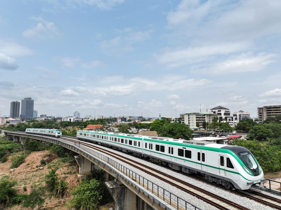 Chinese-made electric multiple unit (EMU) trains run on the metro rail track in Abuja, Nigeria, May 23, 2024. /Xinhua