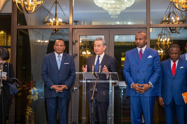 Chinese Foreign Minister Wang Yi speaks to reporters after meeting with Congolese President Denis Sassou Nguesso in Brazzaville, capital of the Republic of Congo, January 7, 2025. /Chinese Foreign Ministry