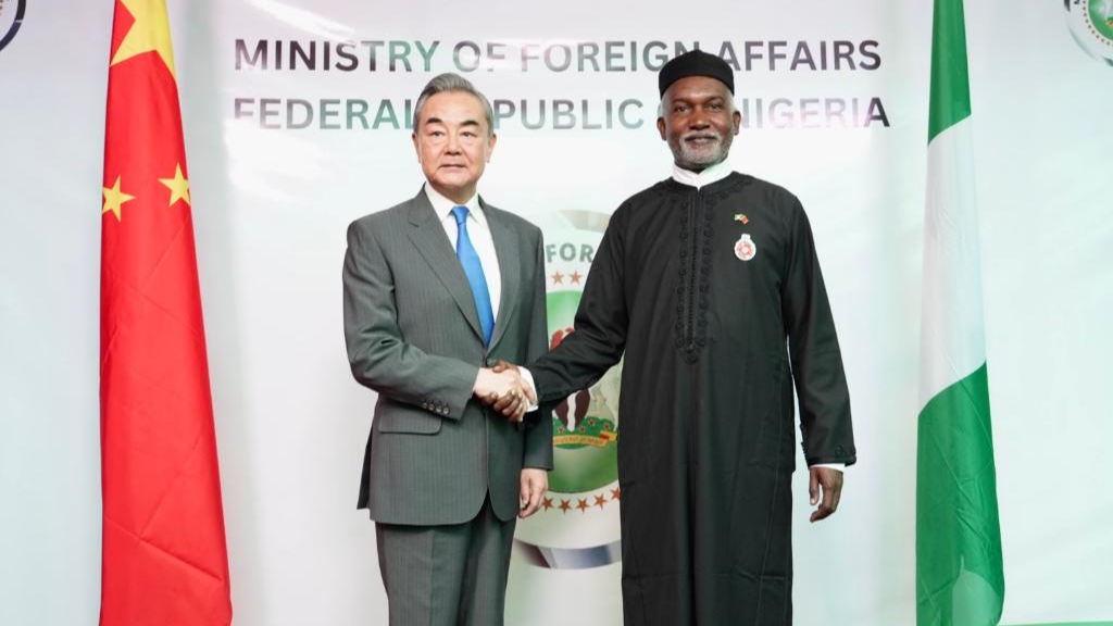 Chinese Foreign Minister Wang Yi (L), also a member of the Political Bureau of the Communist Party of China Central Committee, shakes hands with Nigerian Foreign Minister Yusuf Tuggar during their meeting in Abuja, Nigeria, January 9, 2025. /Xinhua