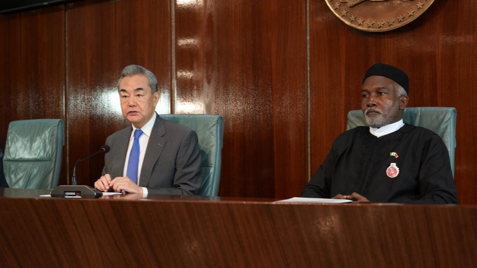 Chinese Foreign Minister Wang Yi, also a member of the Political Bureau of the Communist Party of China Central Committee, and Nigerian Foreign Minister Yusuf Tuggar meet the press in Abuja, Nigeria, January  9, 2025. /Xinhua