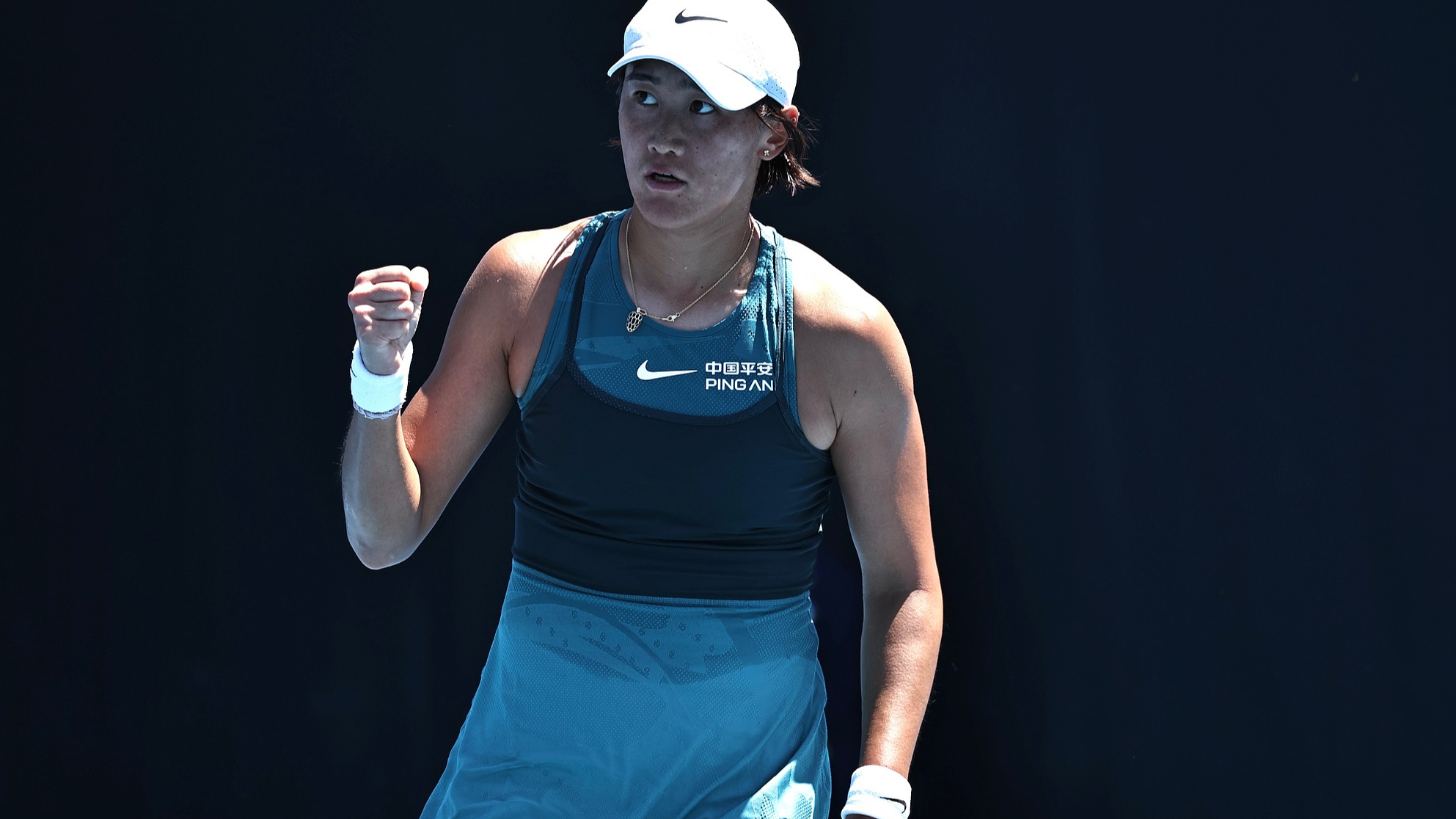 China's Wang Xiyu reacts after taking a point against Julia Grabher in their women's singles first round match on the third day of the Australian Open in Melbourne, Australia, January 14, 2025. /CFP