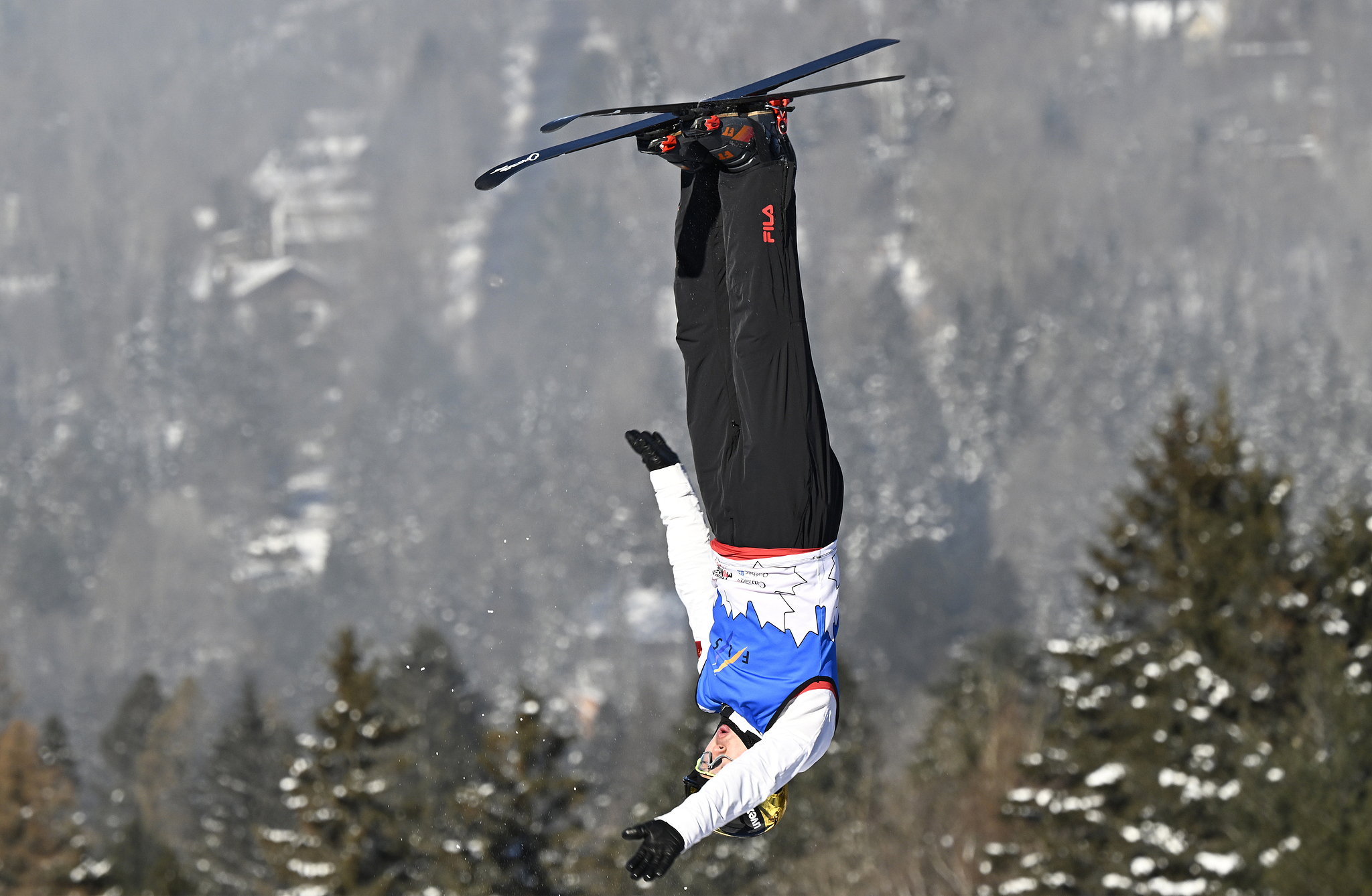 Qi Guangpu of China competes in the men