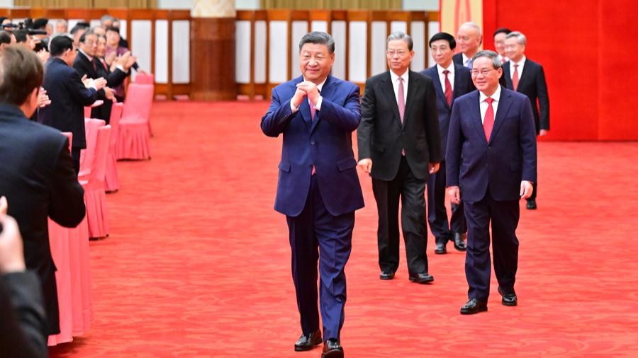 Chinese President Xi Jinping, also general secretary of the Communist Party of China Central Committee and chairman of the Central Military Commission, greets with attendees at a Spring Festival reception in Beijing, China, January 27, 2025. /Xinhua