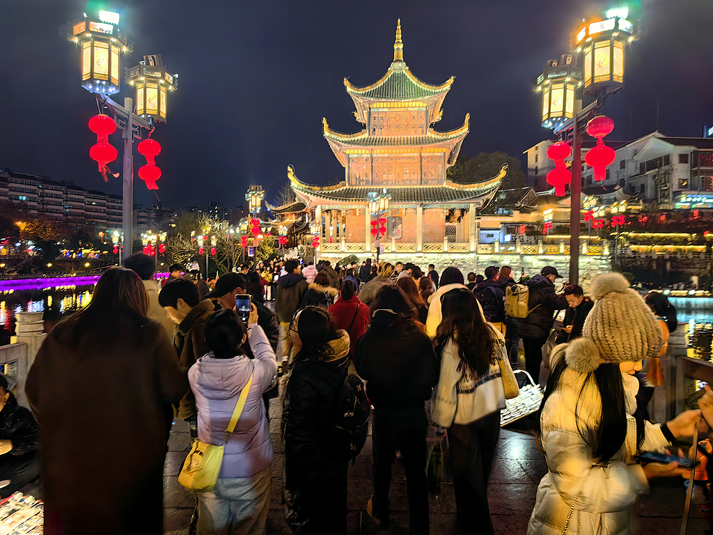 Spring Festival tourists flock to the iconic Jiaxiu Tower in Guiyang, Guizhou Province, on February 4, 2025. /VCG