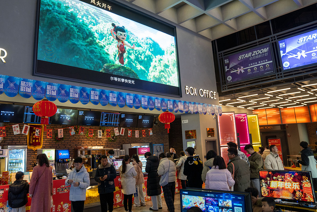 Driven by blockbuster releases, movie-goers throng concession stands at a cinema in Feidong County, Hefei, Anhui Province, China. on February 3, 2025. /VCG