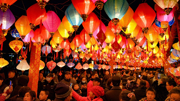China marks Lantern Festival with glowing lights and sweet traditions ...