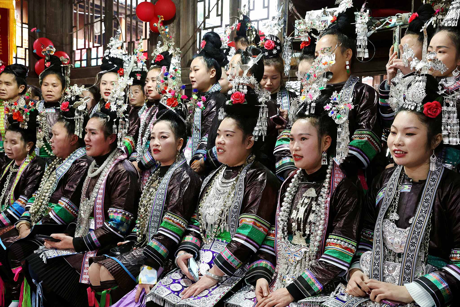 Women of the Dong ethnic group perform the Grand Song at a Dong village in Guizhou Province. /VCG