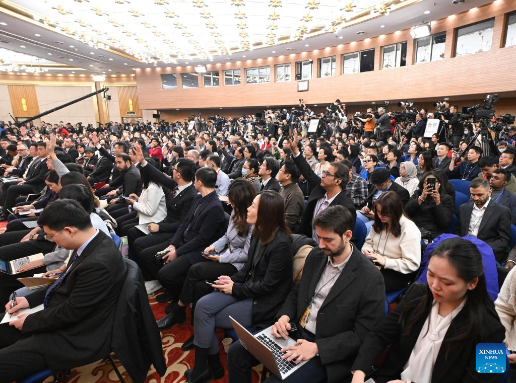 Journalists from around the world attend a press conference on China's foreign policy and external relations on the sidelines of the third session of the 14th National People's Congress in Beijing, China, March 7, 2025. /Xinhua