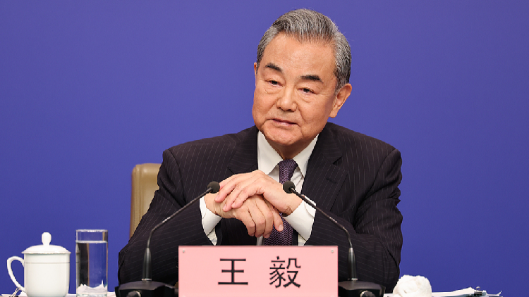 Wang Yi: China leads development of global women's cause - CGTN