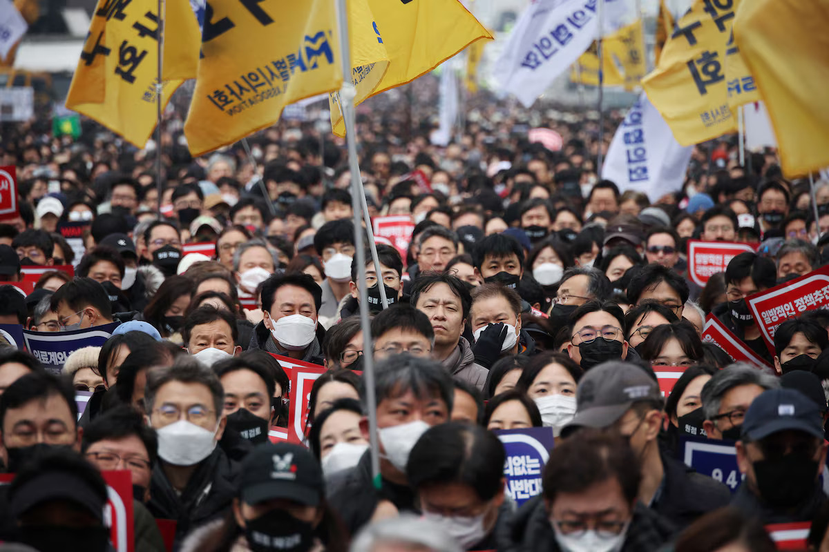 FILE: Doctors take part in a rally to protest against government plans to increase medical school admissions in Seoul, South Korea, March 3, 2024. /Reuters