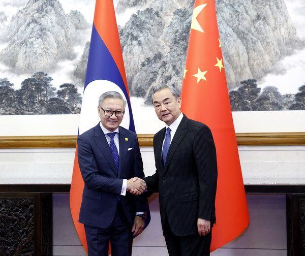 Chinese Foreign Minister Wang Yi, also a member of the Political Bureau of the Communist Party of China Central Committee, holds talks with Lao Minister of Foreign Affairs Thongsavanh Phomvihane in Beijing, capital of China, March 13, 2025. /Chinese Foreign Ministry 