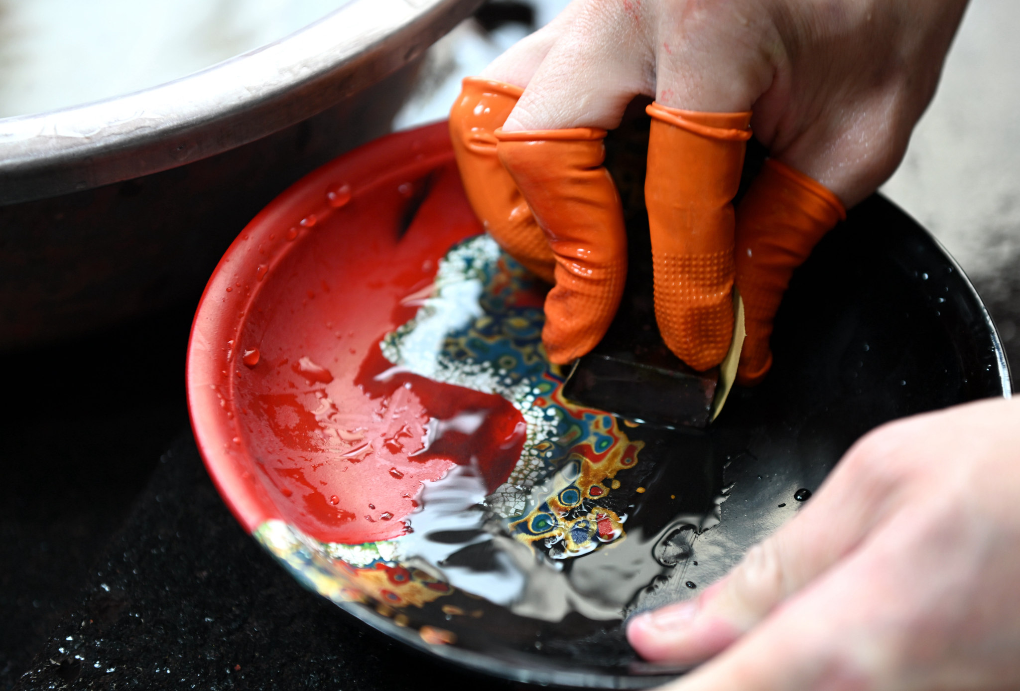 Lacquer artists work on bringing vibrant creations to life at a workshop in Fuzhou, Fujian Province, March 13, 2025. /VCG