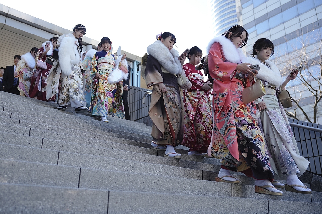 Kimono-clad women walk to the venue of a ceremony to celebrate Coming-of-Age Day, in Yokohama, near Tokyo, Japan, January 13, 2025. /CFP