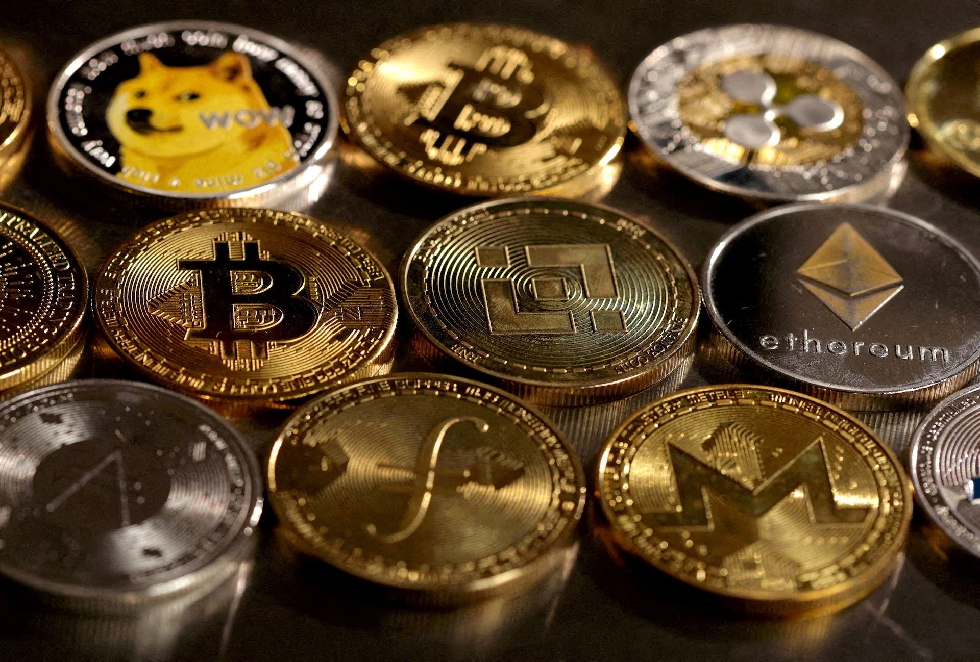An illustration of cryptocurrencies. /Reuters