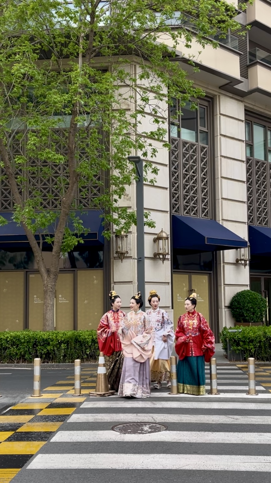 Hanfu enthusiasts stroll through Beijing's Central Business District, April 16, 2025. /CGTN