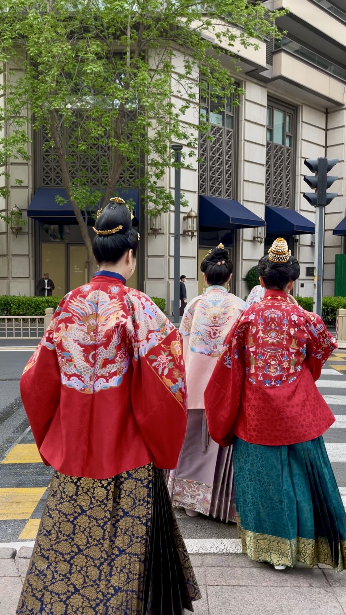 Hanfu enthusiasts stroll through Beijing's Central Business District, April 16, 2025. /CGTN