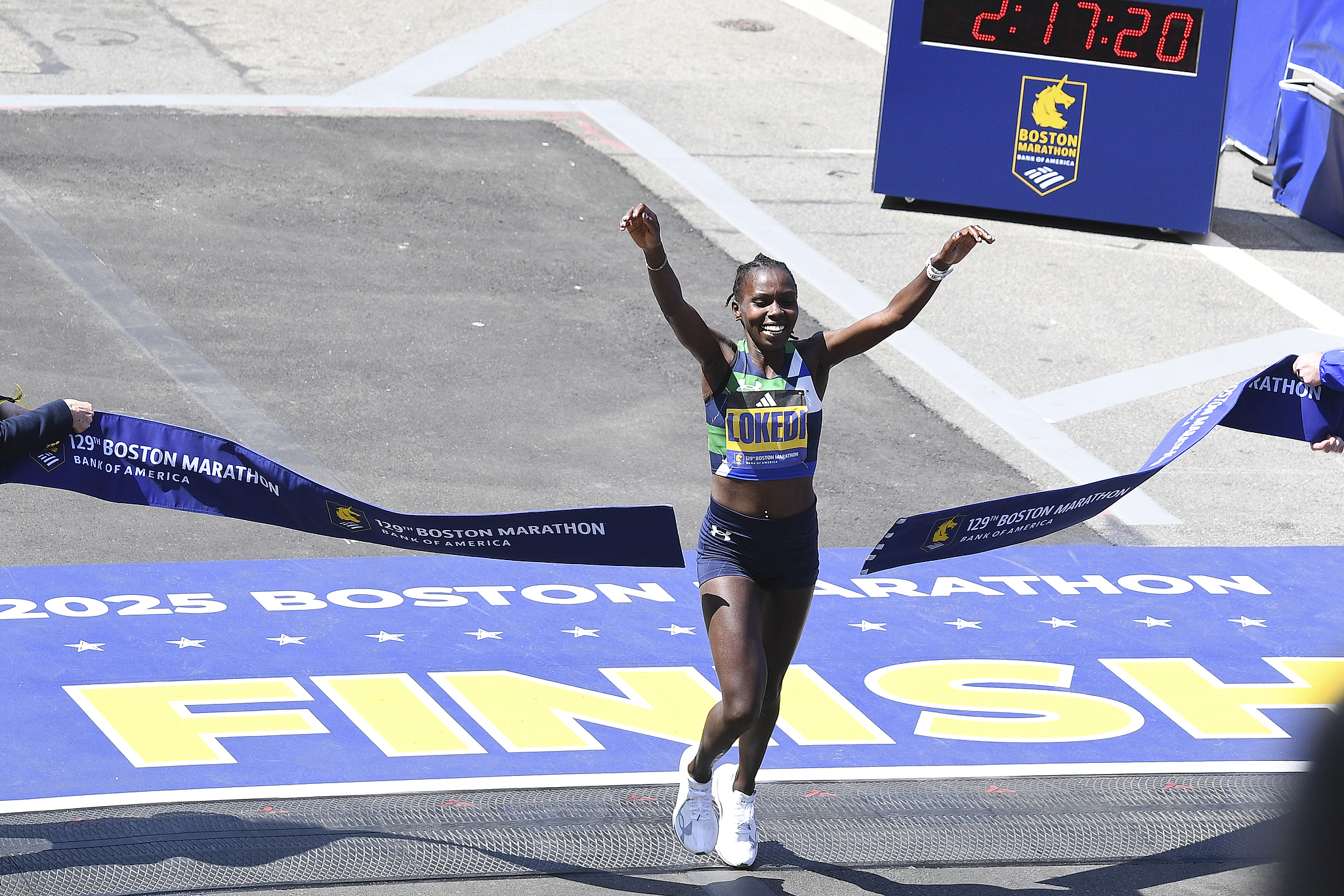 Sharon Lokedi of Kenya crosses the finish line of the 129th Boston Marathon in Boston, U.S., April 21, 2025. /VCG