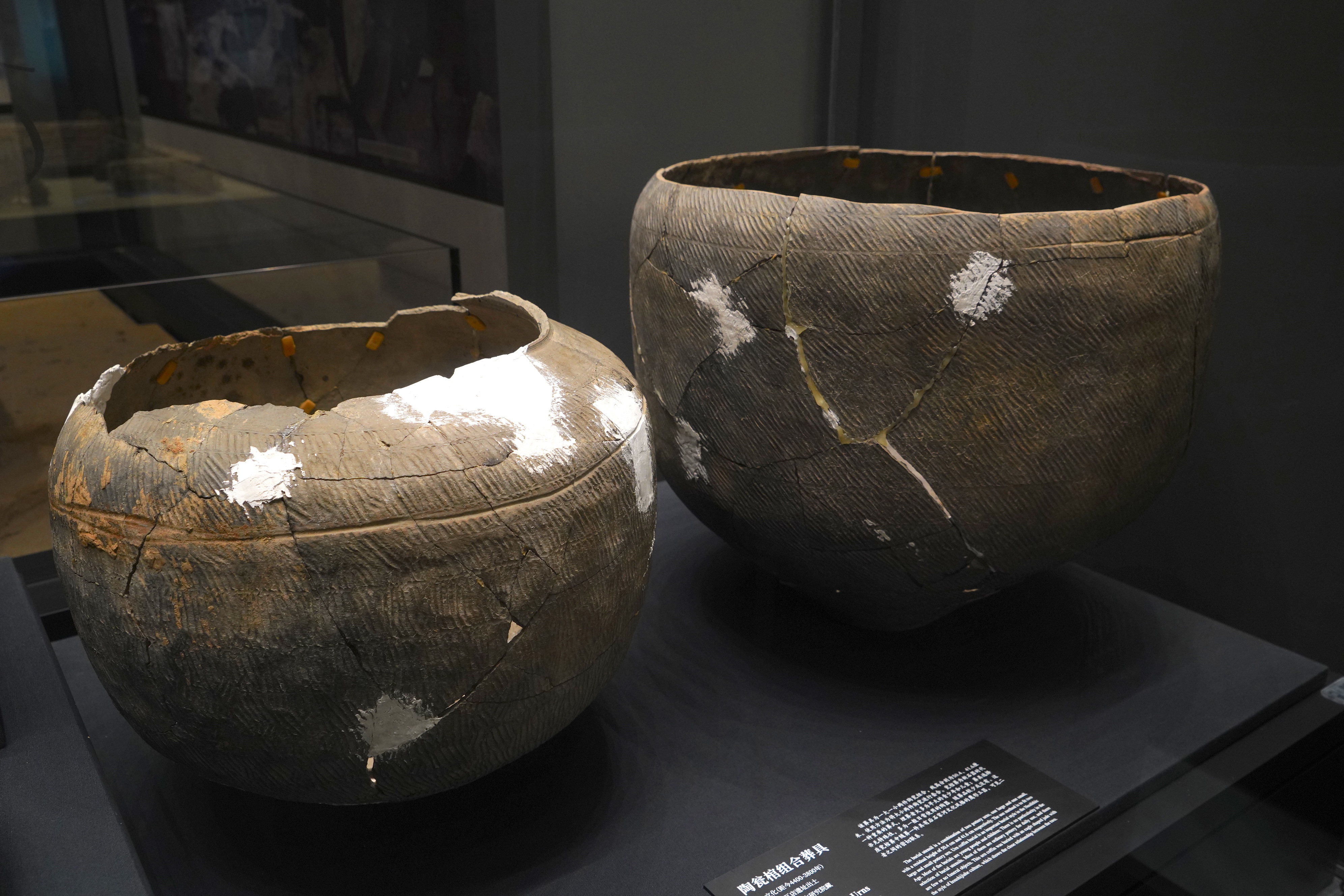 Pottery funerary urns are displayed at the Erlitou Site Museum of the Xia Capital in Luoyang, Henan Province, on April 22, 2025. /CGTN