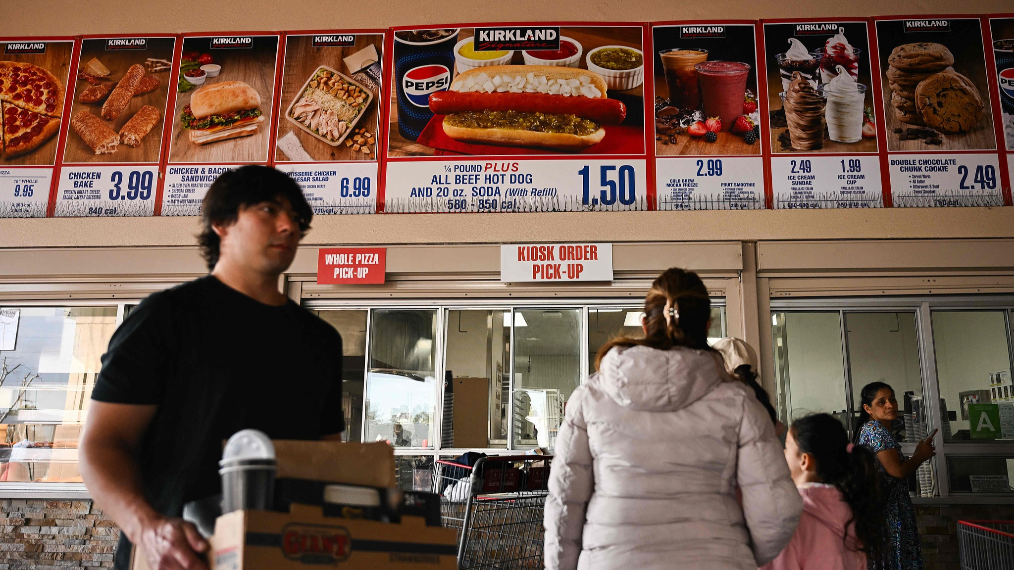 A woman looks at eggs for sale in a Giant grocery store in McLean, Virginia, the U.S., January 28, 2025. /CFP