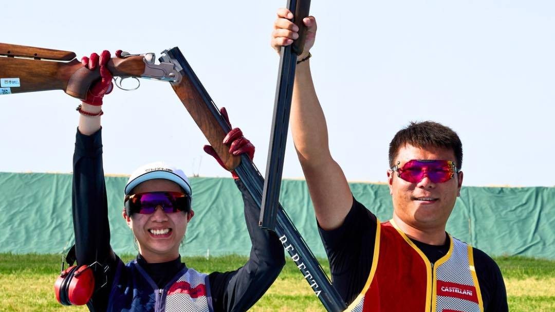 Qi Ying (L) and Zhang Zixi of China win the mixed team trap gold medal at the International Shooting Sport Federation (ISSF) World Cup in Nicosia, Cyprus, May 11, 2025. /ISSF