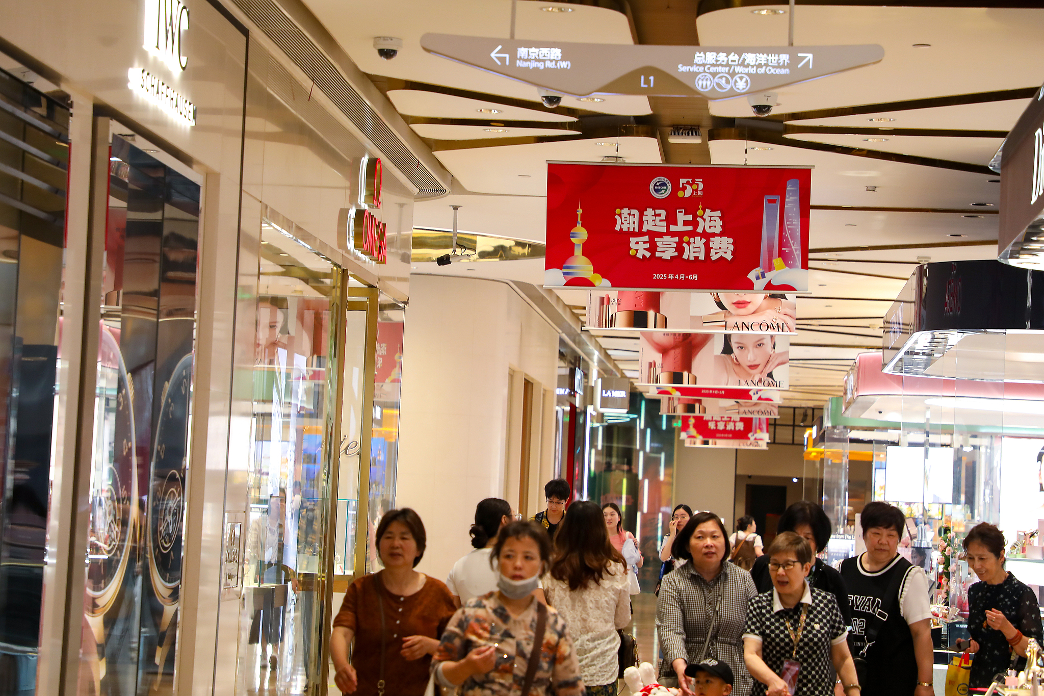 A shopping mall bustling with consumers in Shanghai, China, May 17, 2025. / VCG