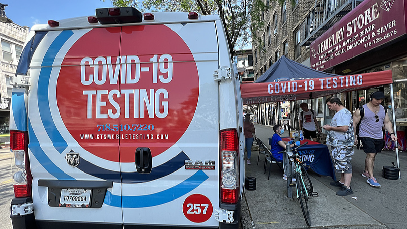 A mobile COVID-19 testing station is set up on a sidewalk in New York City, U.S., May 31, 2022. /VCG