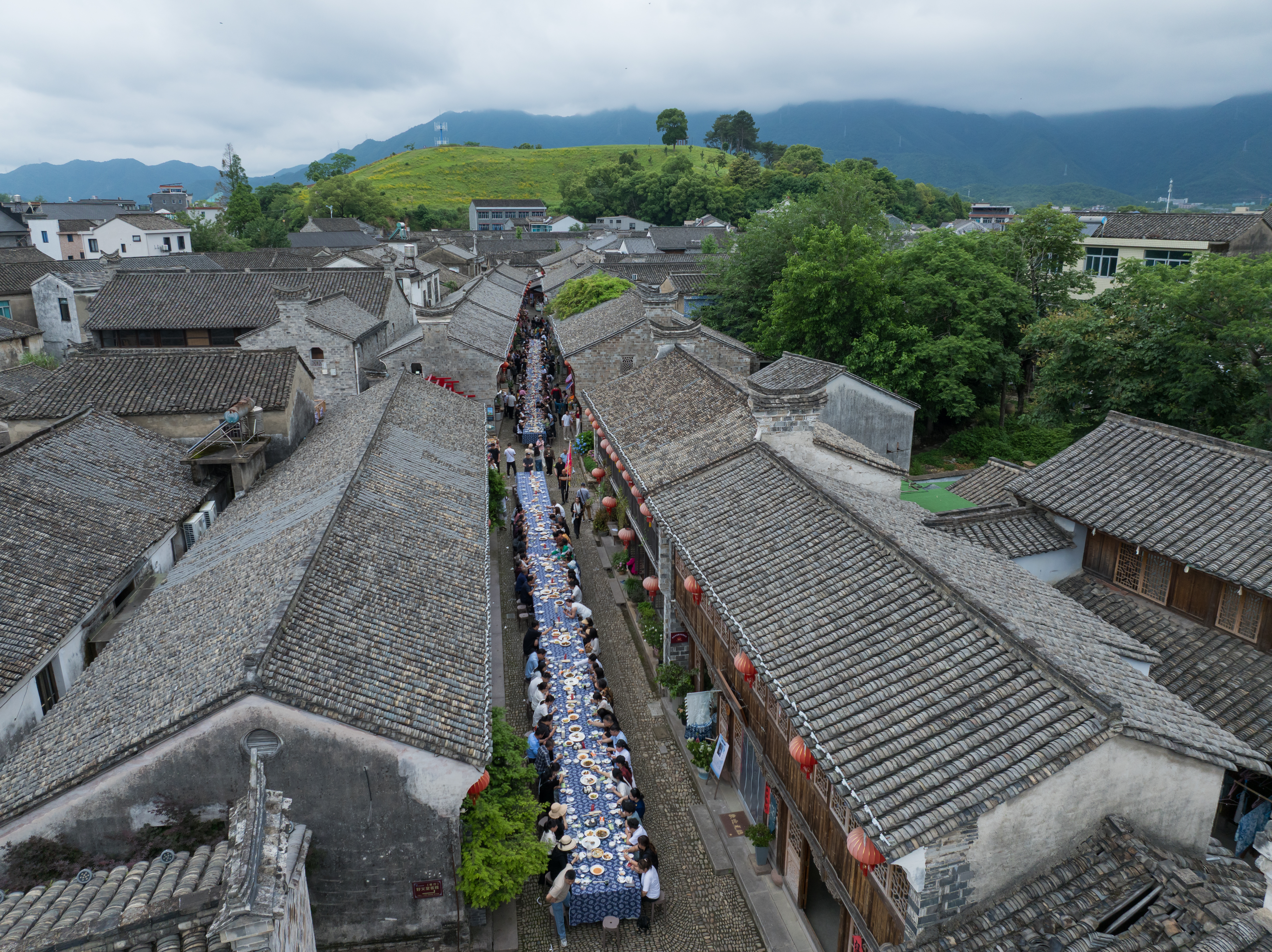A bird's eye-view of the long-table banquet at Qiantong Ancient Town in Ningbo, Zhejiang Province on May 18, 2025. /Photo provided to CGTN by Publicity Department of Ninghai County Committee
