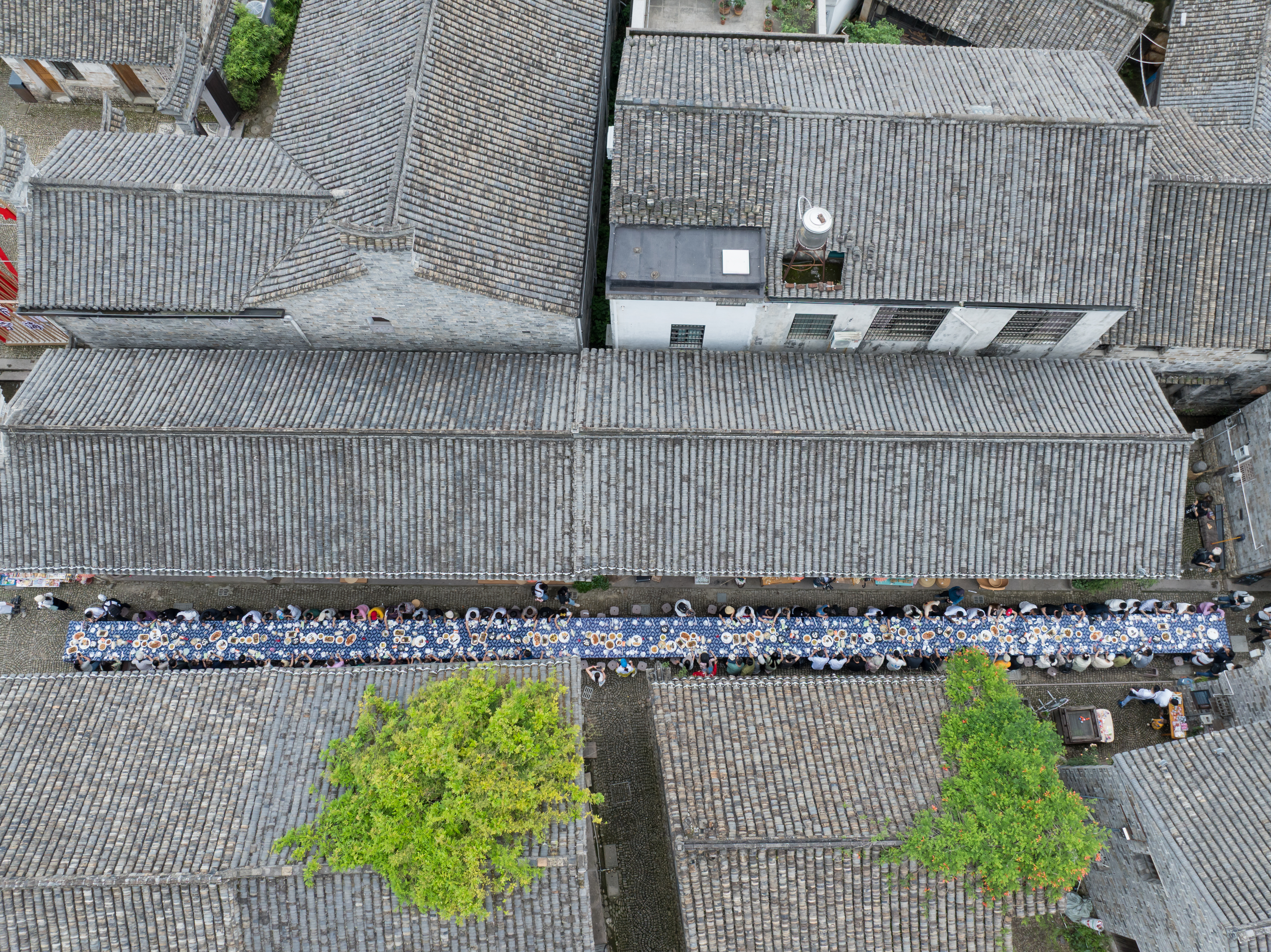 A bird's eye-view of the long-table banquet at Qiantong Ancient Town in Ningbo, Zhejiang Province on May 18, 2025. /Photo provided to CGTN by Publicity Department of Ninghai County Committee