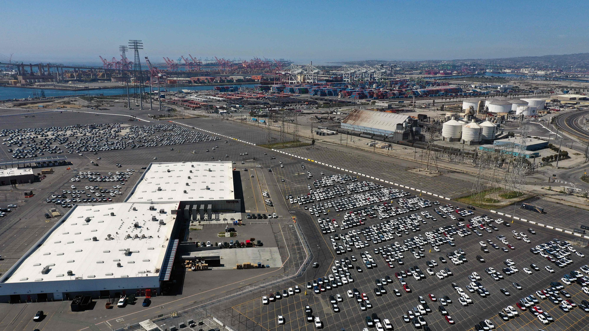 An aerial image shows Toyota and Lexus cars unloaded from ships to the Toyota Logistics Services Inc. automotive processing terminal at the Port of Long Beach, California, the United States, April 10, 2025. /VCG