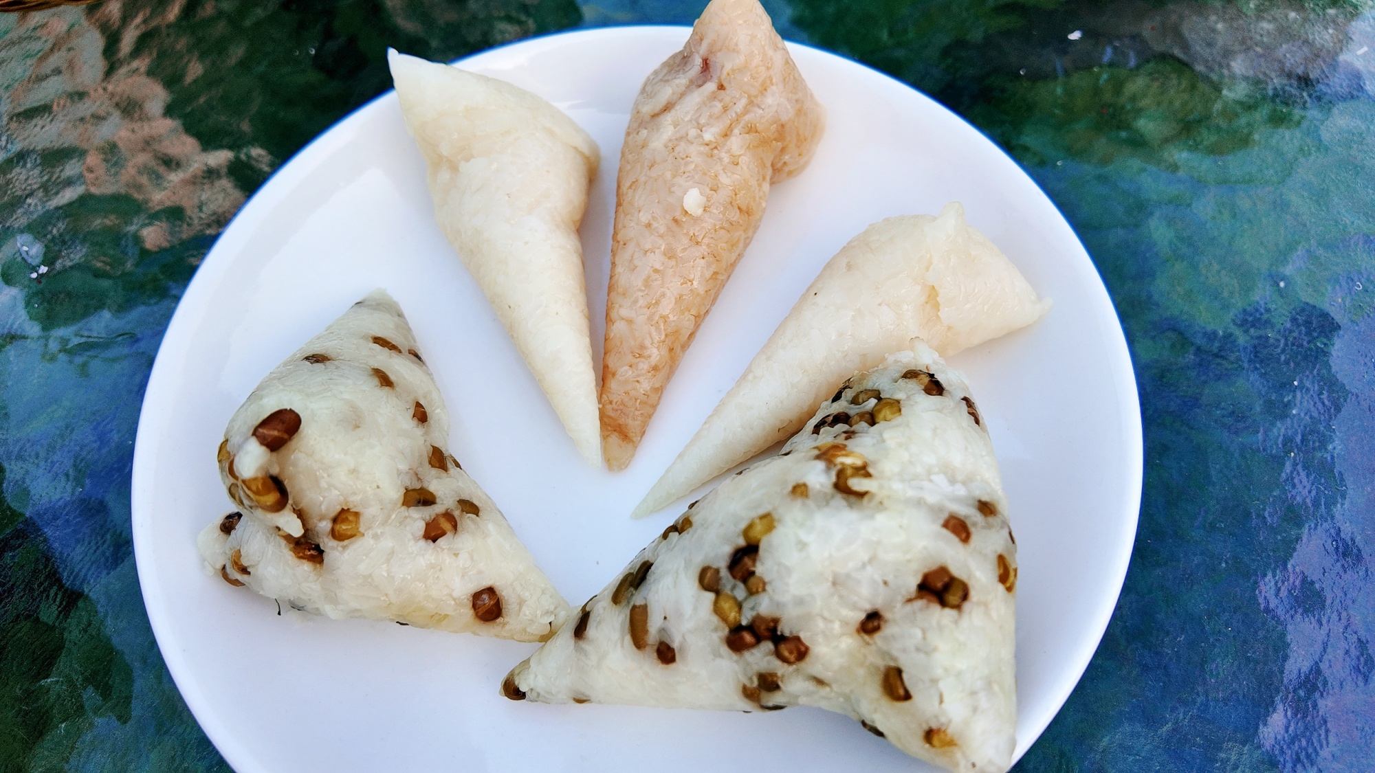 A traditional handmade zongzi is seen in Sinan County, southwest China's Guizhou Province, on May 20, 2025. /Photo provided to CGTN