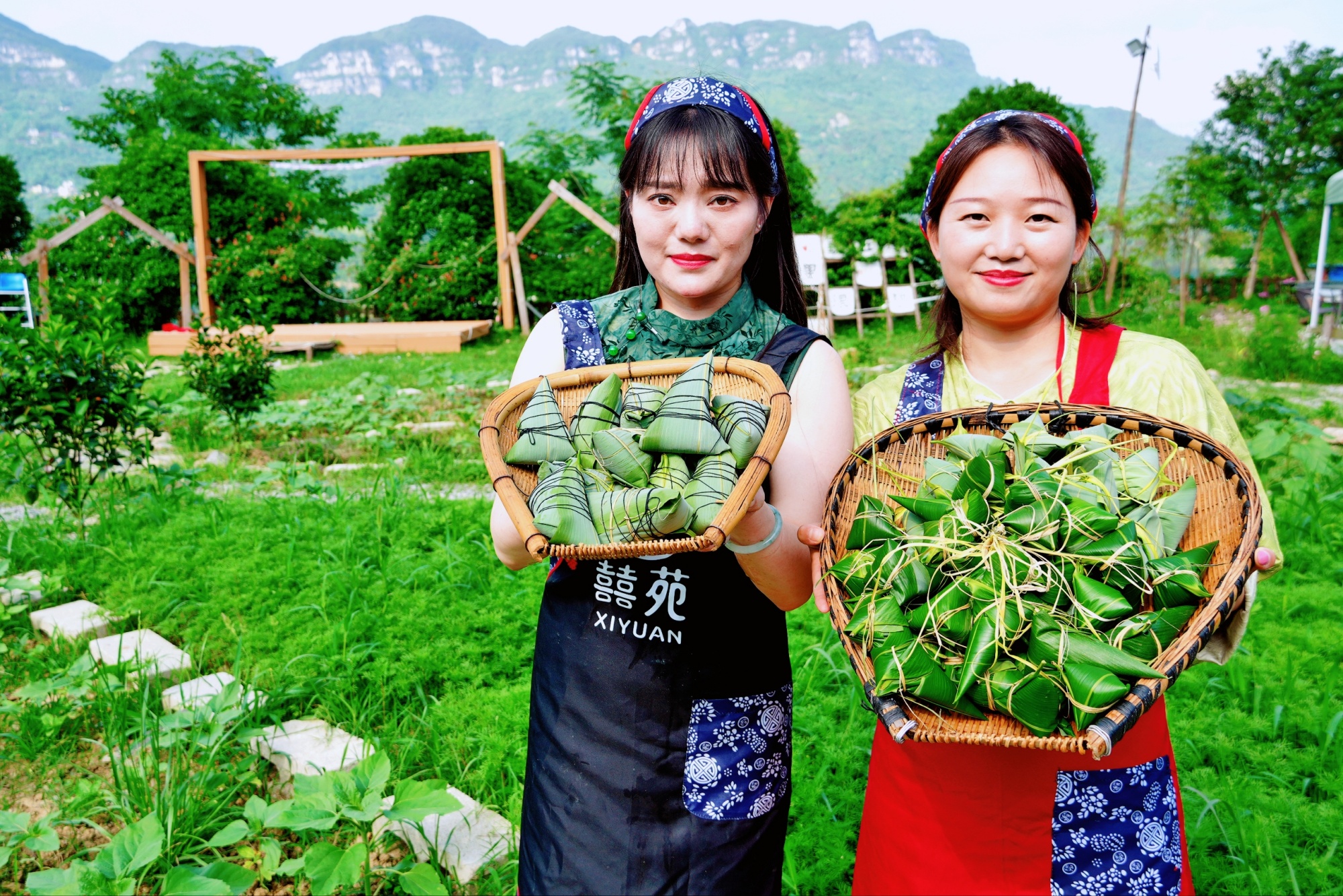 Women show traditional handmade zongzi in Sinan County, southwest China's Guizhou Province, on May 20, 2025. /Photo provided to CGTN
