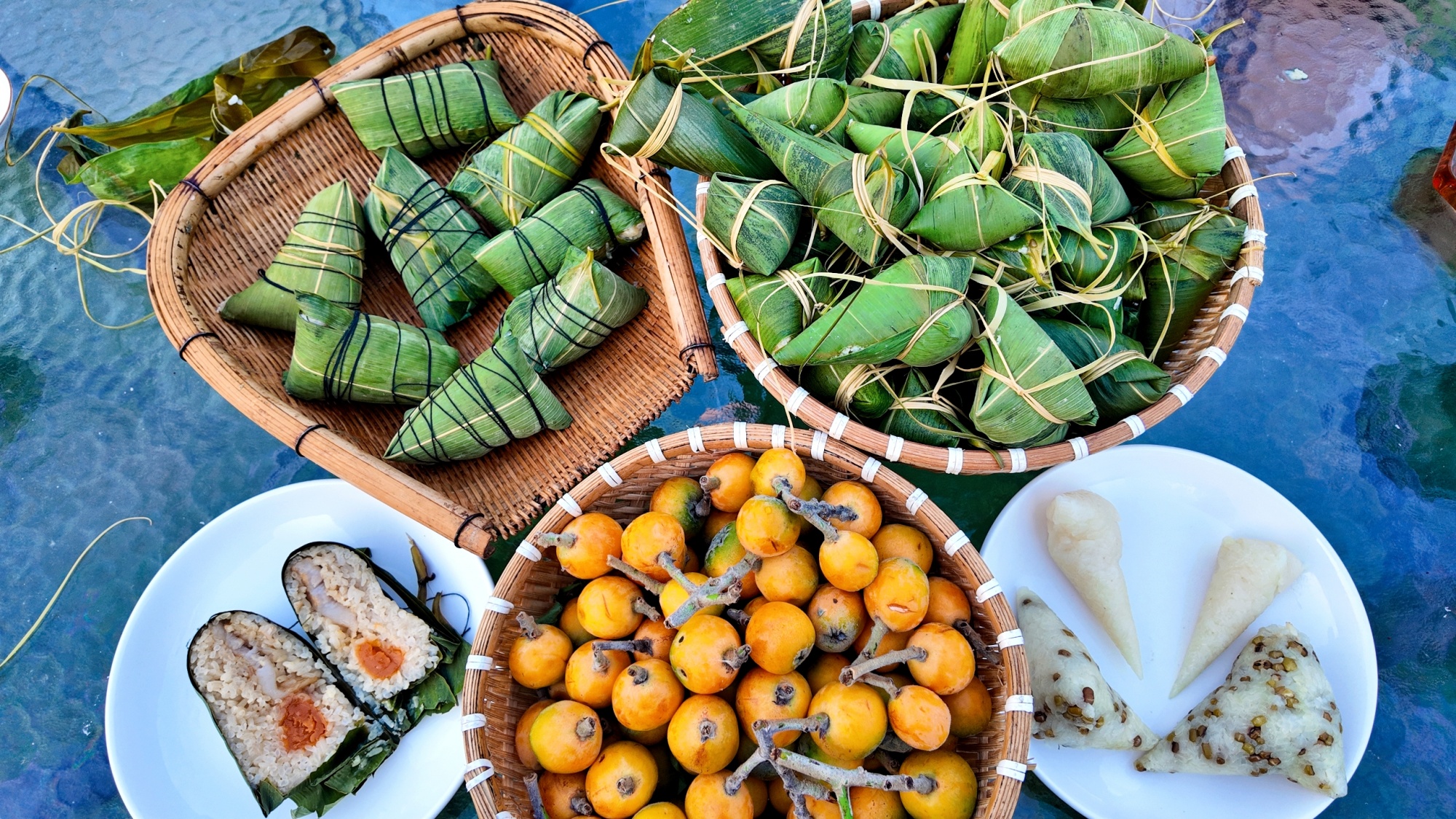 Different types of traditional handmade zongzi are seen in Sinan County, southwest China's Guizhou Province, on May 20, 2025. /Photo provided to CGTN