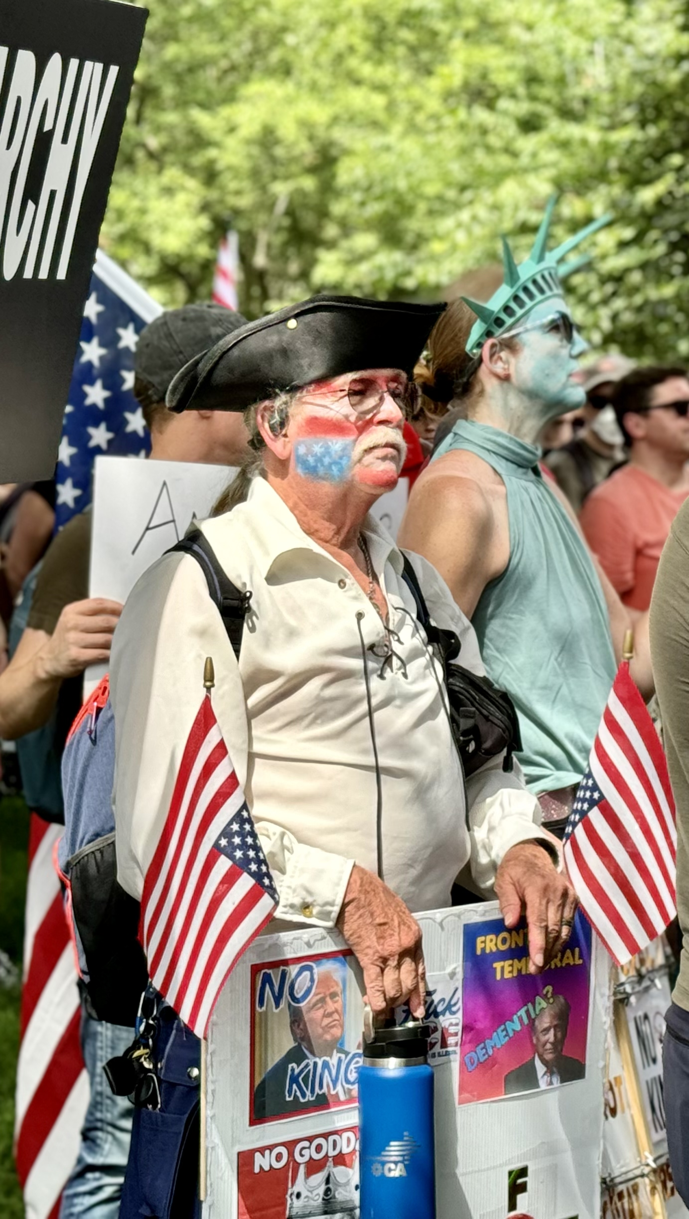People protest against the Trump administration during a military parade marking the 250th anniversary of the U.S. Army outside the White House, Washington D.C., U.S., June 14, 2025. /CGTN