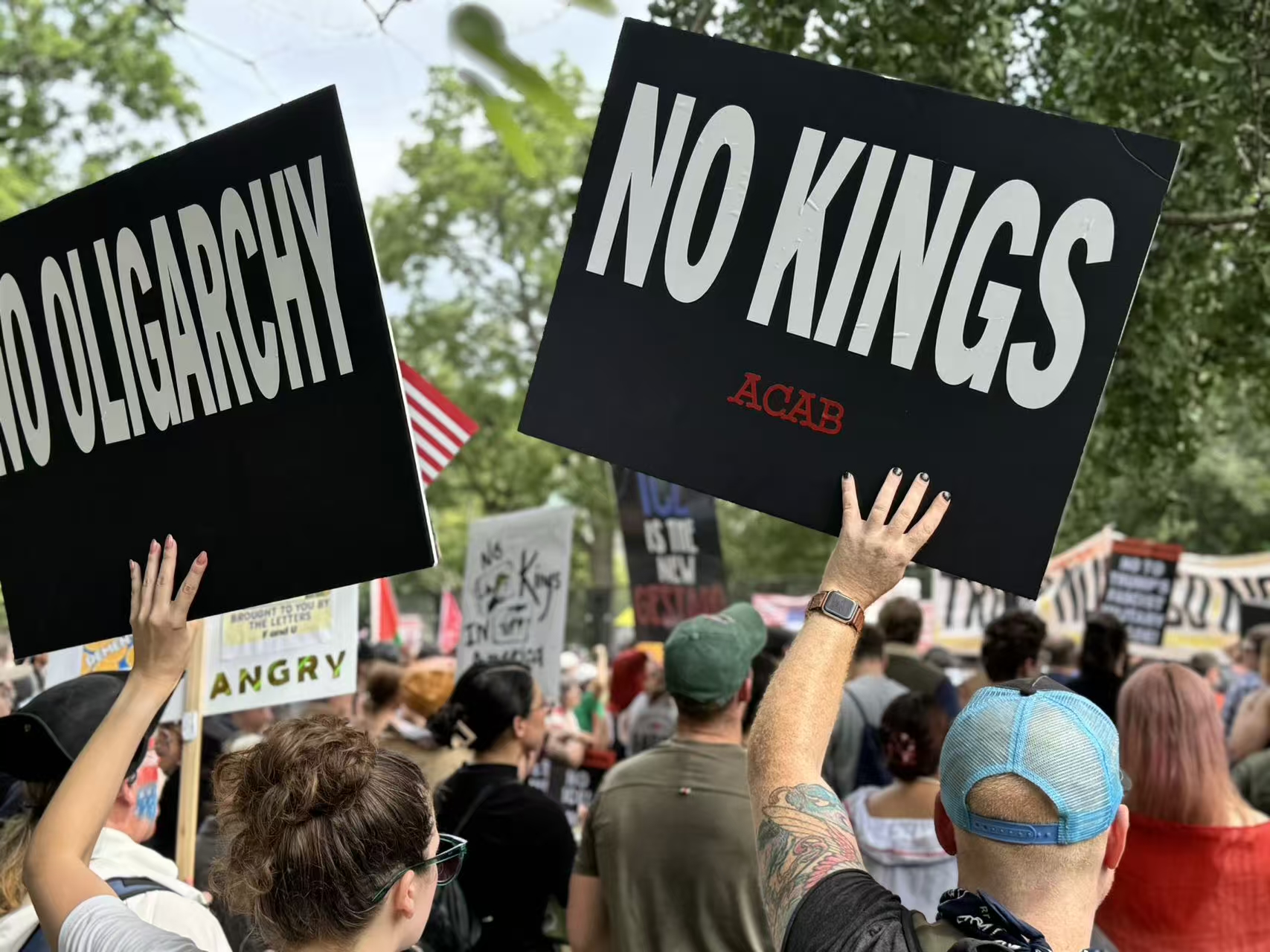 People protest against the Trump administration during a military parade marking the 250th anniversary of the U.S. Army outside the White House, Washington D.C., U.S., June 14, 2025. /CGTN