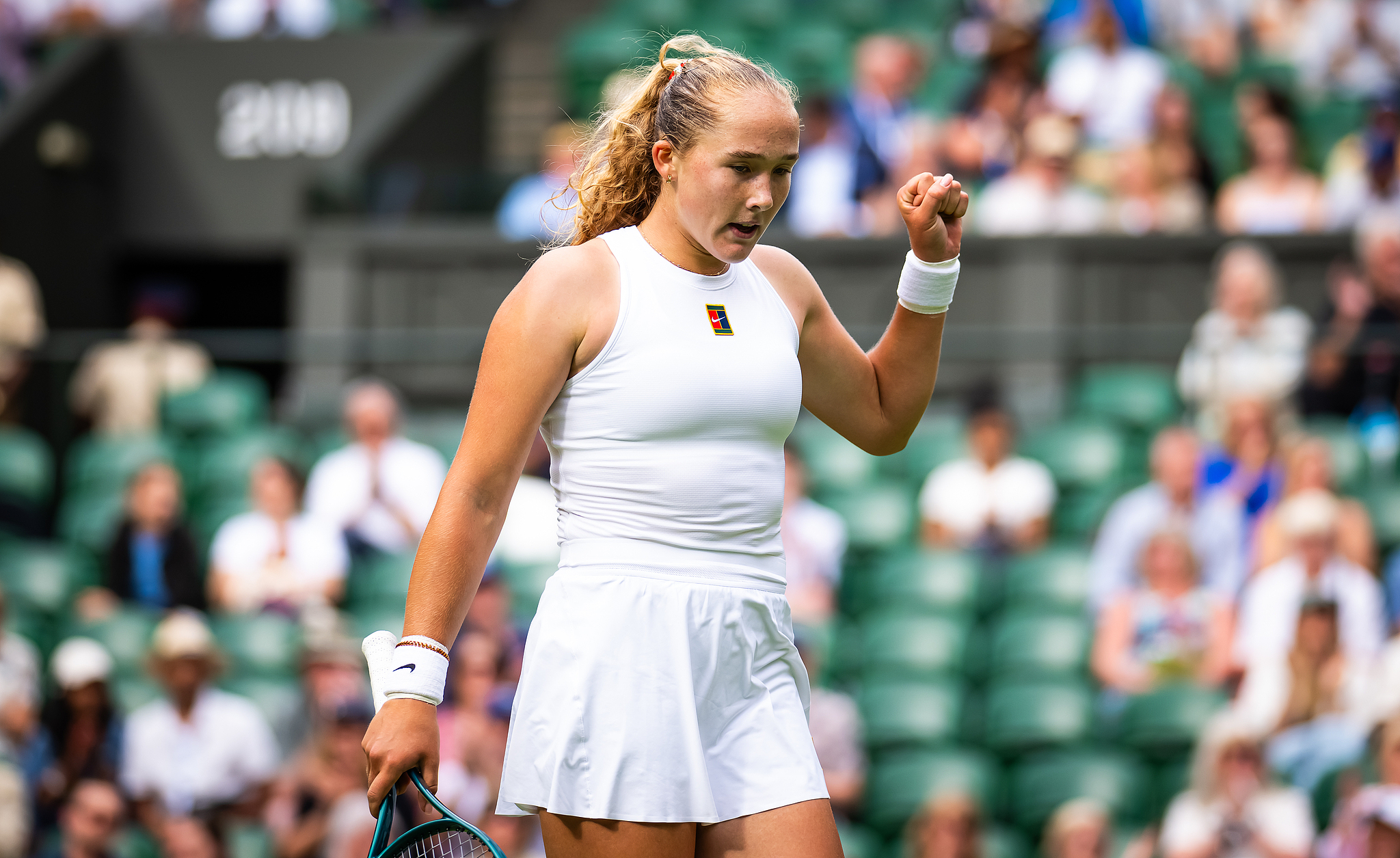 Mirra Andreeva of Russia reacts to scoring a point in the women's singles round of 16 match against Emma Navarro of the U.S. at the All England Lawn Tennis and Croquet Club in London, Britain, July 7, 2025. /VCG
