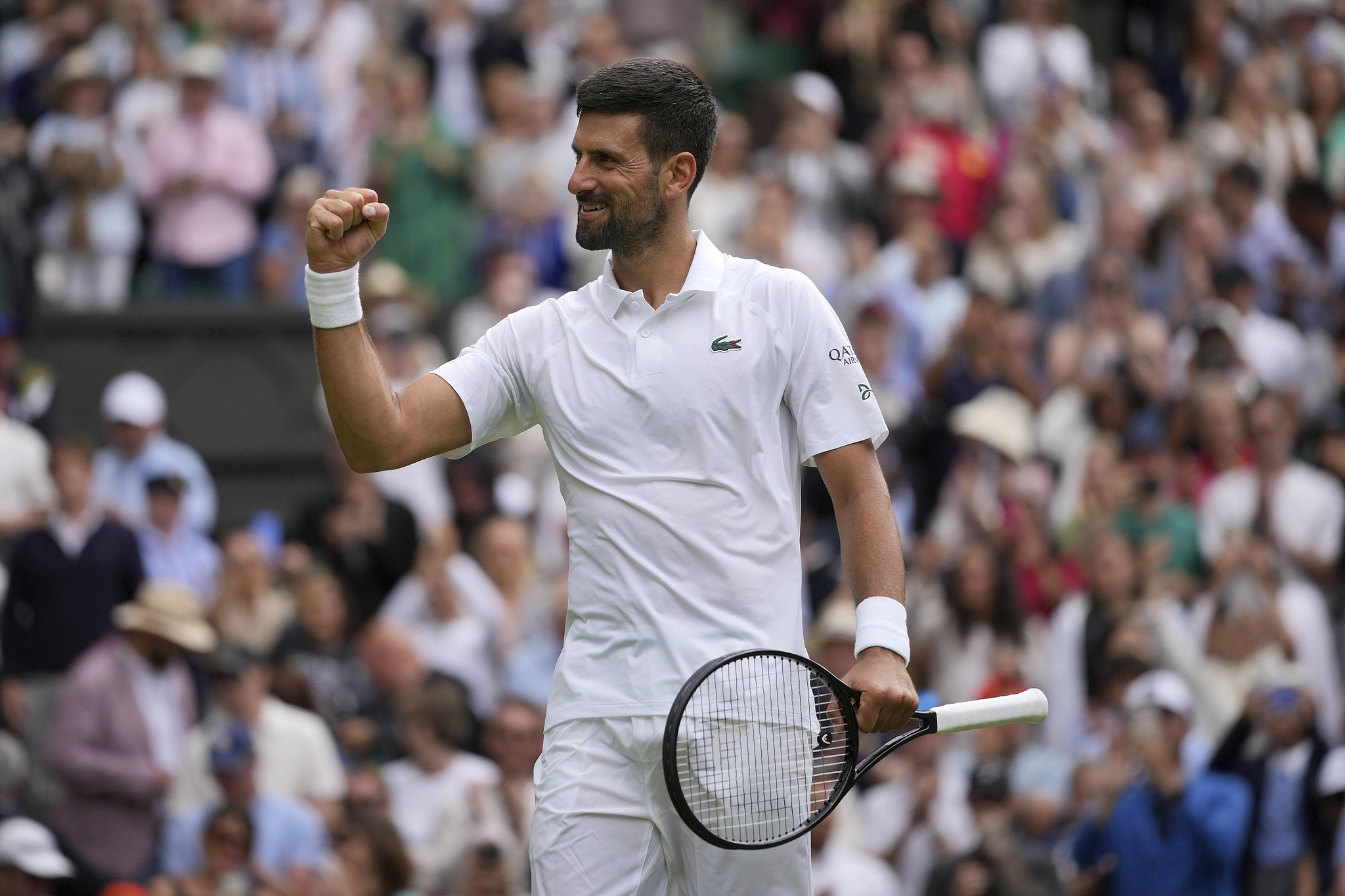 Novak Djokovic of Serbia reacts to scoring a point in the men's singles round of 16 match against Alex de Minaur of Australia at the Wimbledon Championships at the All England Lawn Tennis and Croquet Club in London, Britain, July 7, 2025. /VCG