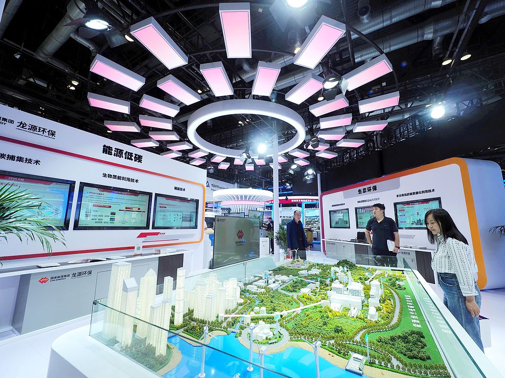 People visit the latest achievements in low-carbon, green technologies at the 27th China Beijing International High-tech Expo held at the China National Convention Center, May 8, 2025. /CFP