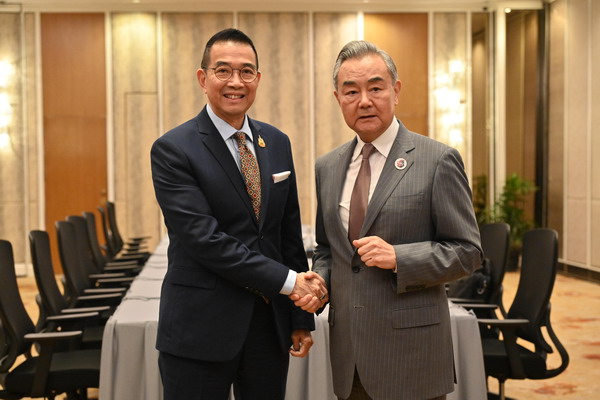 Chinese Foreign Minister Wang Yi meets with Thai Foreign Minister Maris Sangiampongsa on the sidelines of the ASEAN Foreign Ministers' Meetings, July 10, 2025, Kuala Lumpur, Malaysia. /Ministry of Foreign Affairs
