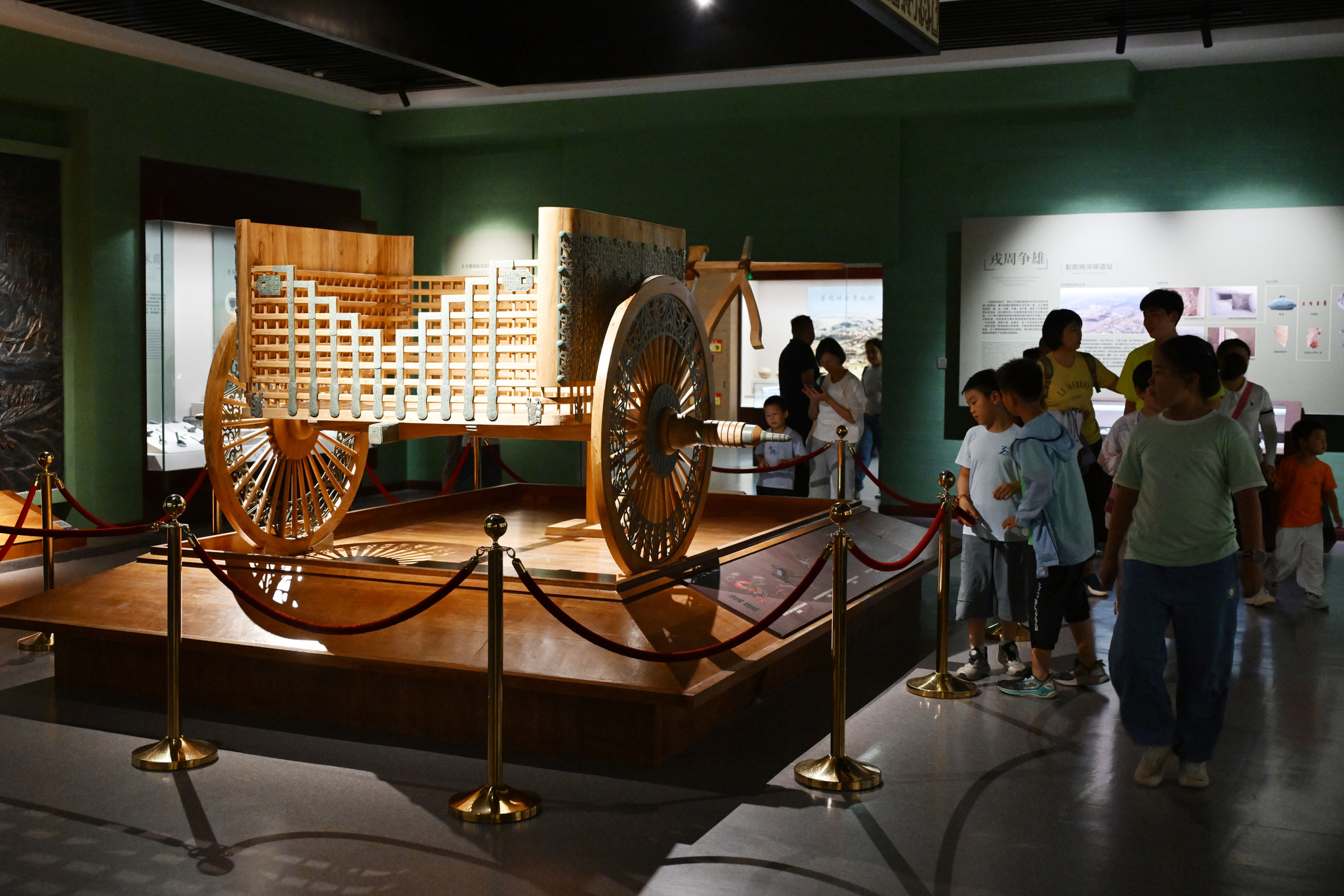 Visitors learn about the relics housed at Ningxia Museum on July 9, 2025. /VCG
