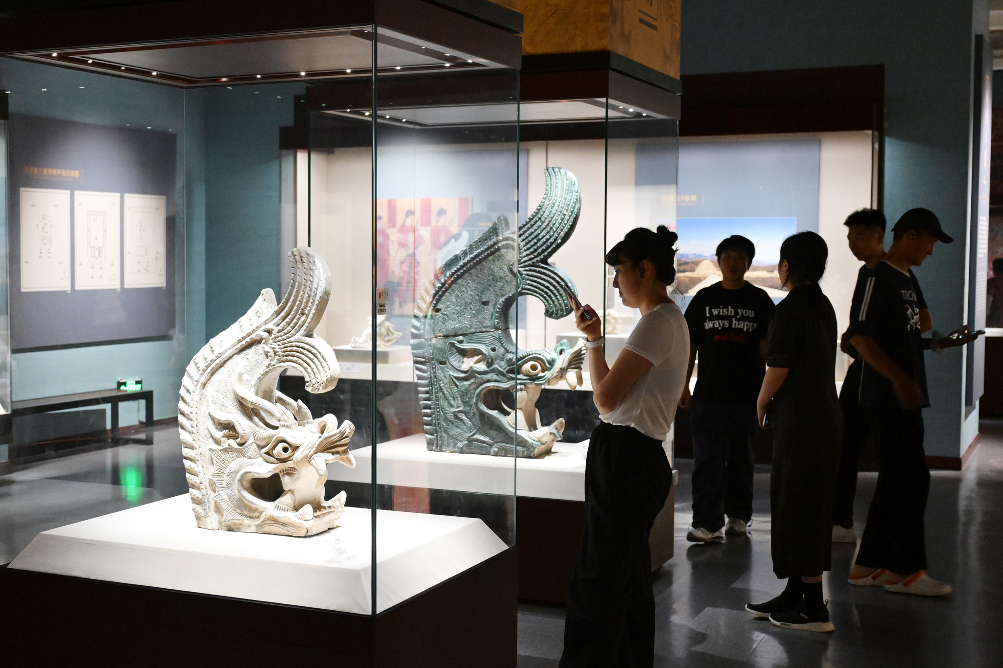 Visitors learn about the relics housed at Ningxia Museum on July 9, 2025. /VCG
