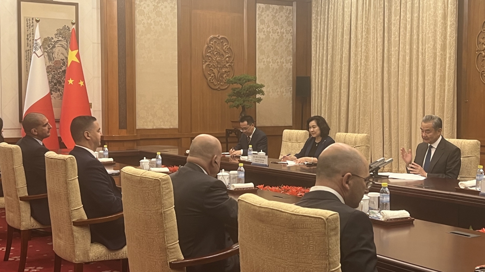 Chinese Foreign Minister Wang Yi holds talks with Ian Borg, Malta's deputy prime minister and minister for foreign affairs and tourism, in Beijing, China, July 14, 2025. /CGTN