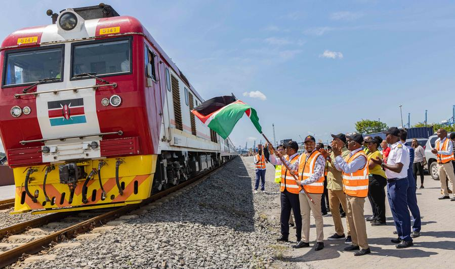 Mohamed Daghar (R, Front), principal secretary in the Ministry of Roads and Transport, flags off new passenger coaches from China at Kenya's port city of Mombasa, July 22, 2024. /Xinhua