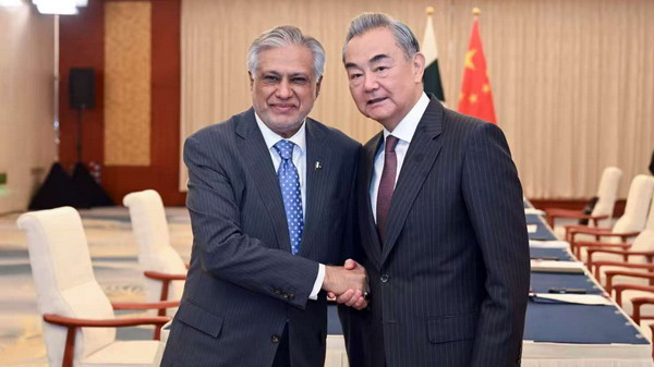 Chinese Foreign Minister Wang Yi (R), also a member of the Political Bureau of the Communist Party of China Central Committee, meets with Pakistan's Deputy Prime Minister and Foreign Minister Mohammad Ishaq Dar in north China's Tianjin, July 16, 2025. /Chinese Foreign Ministry
