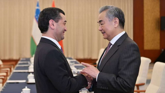 Chinese Foreign Minister Wang Yi (R), also a member of the Political Bureau of the Communist Party of China Central Committee, meets with Uzbek Foreign Minister Bakhtiyor Saidov in north China's Tianjin, July 16, 2025. /Chinese Foreign Ministry