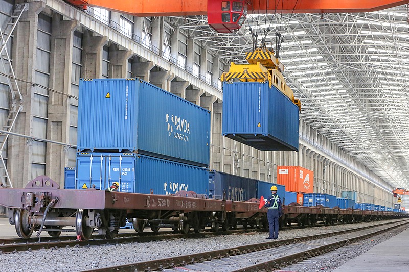 Staff members were directing the operation of the China-Europe freight train in the transshipment area of Alashankou Station in China's Xinjiang Uygur Autonomous Region, June 24, 2025. /CFP